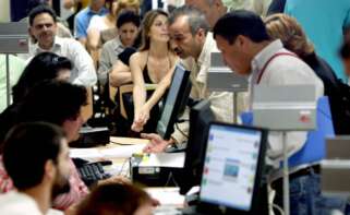 Funcionarios. Foto: EFE.