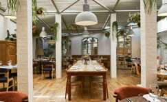 La sala de The Greenhouse simula el comedor de una familia