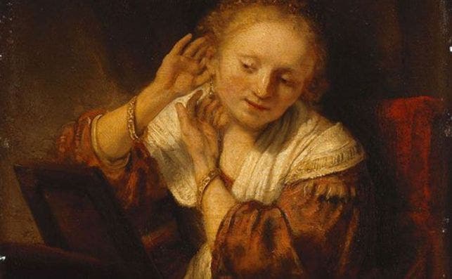 Rembrandt â€œA Young Woman Trying on Earrings Hermitage holland