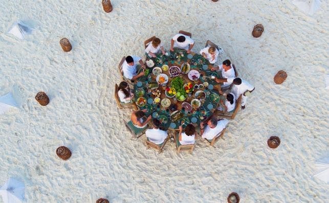 Soneva Fushi Sandbank Dinner aerial6 by Richard Waite