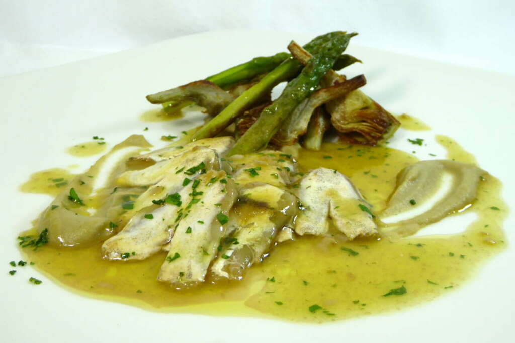 Un plato de kokotxas de merluza