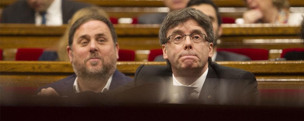 Carles Puigdemont y Oriol Junqueras, durante la sesión de control al presidente en el parlamento catalán, esta semana. EFE/Marta Pérez