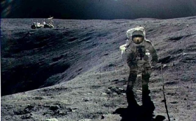 first man on moon walking on the moon 719x544