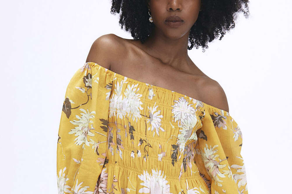 Vestido corto en tejido de crepé de H&M