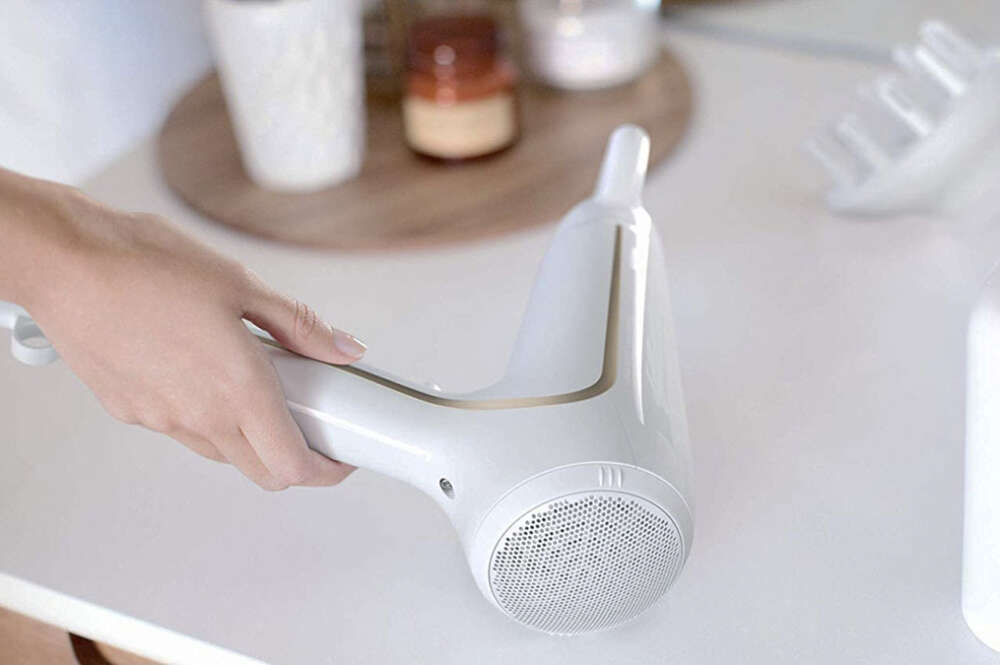Secador philips dry care advanced cheap