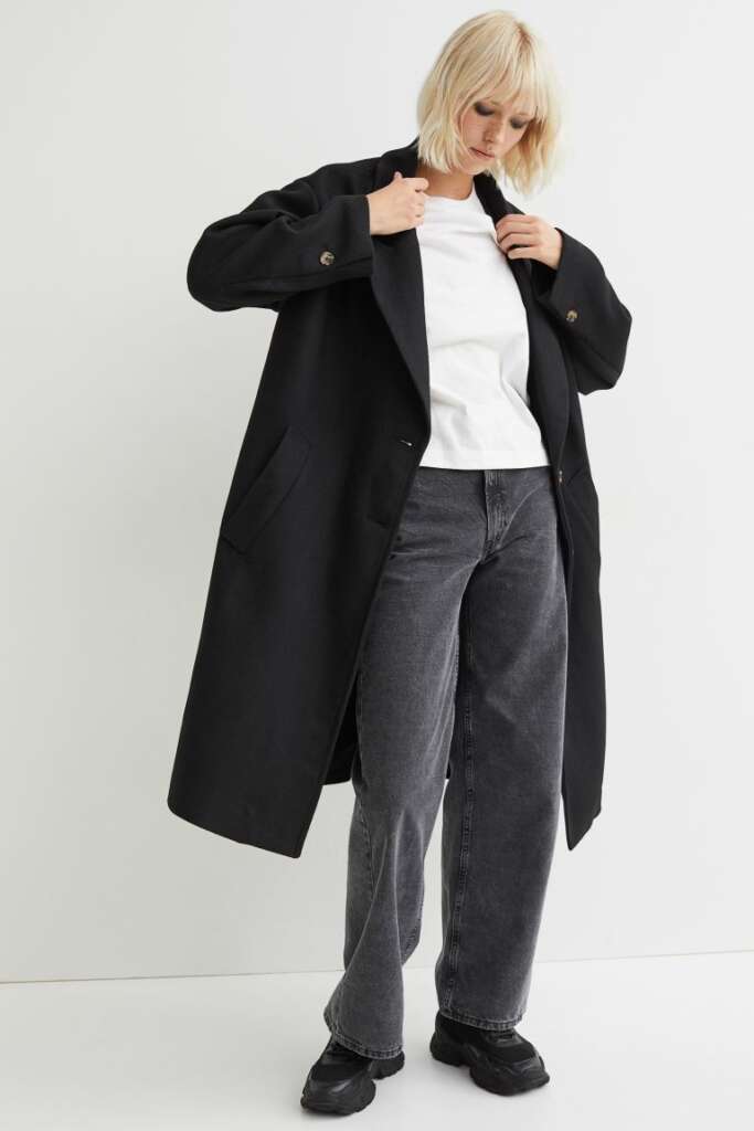 El abrigo negro oversize de H&M ahora rebajado un 40%: básico para tu fondo de armario low cost - Economía Digital