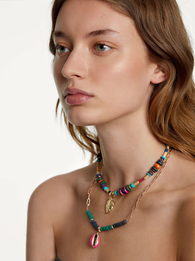 Los collares de verano de Parfois: creatividad y estilo por menos de 8 euros 10 Moncloa Detalles del collar triple abalorios multicolor de Parfois: