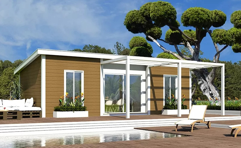 La casa prefabricada con terraza y pérgola ideal para el verano