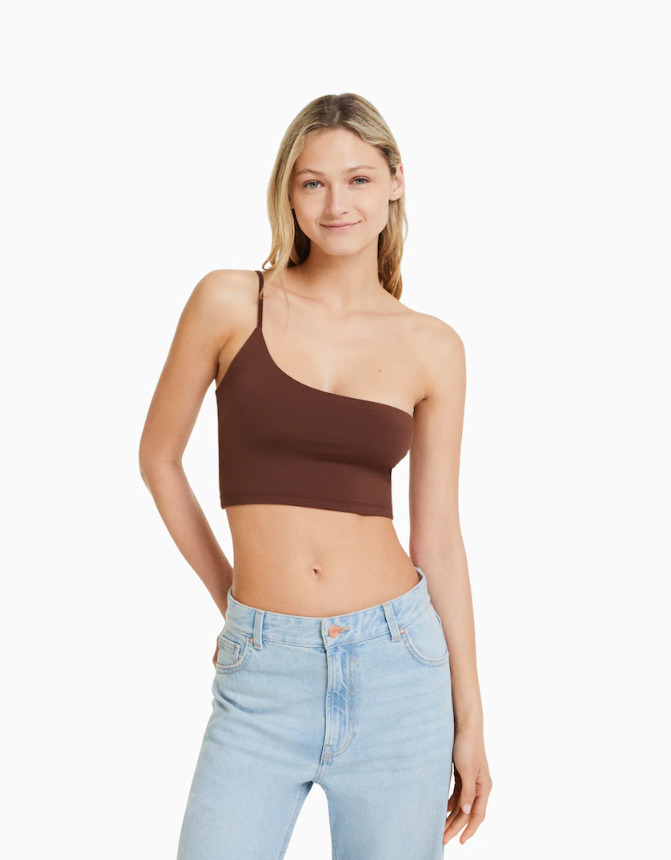 El pantalón naranja de Bershka para combinar con un crop top